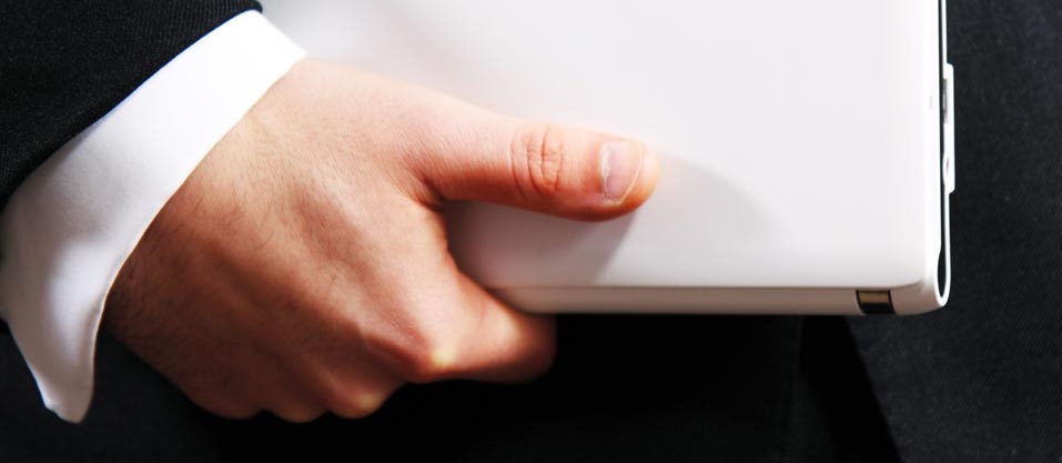 man holding a laptop