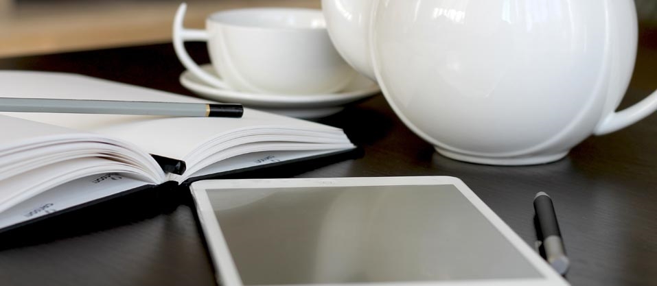 A Table with a notebook and pad